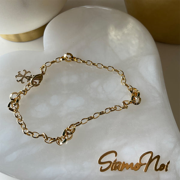 Pulseras cadena con Aros entrelazados. Disponible en set con collar.
