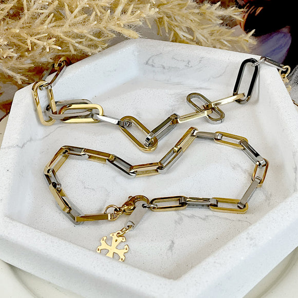 Pulsera de acero Dorada y Plateado gruesa.