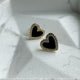 Zarcillo en forma de corazon color negro con borde de zircones en 18k Gold Filled 