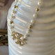 Collar Perlas y Gemstone doradas con Dije símbolo Siamo Noi y cristal Swarovsky