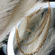 Collar dorado de tres cadenas